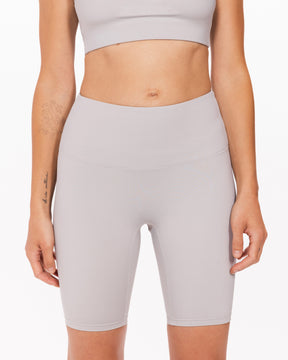 woman wearing grey workout biker shorts
